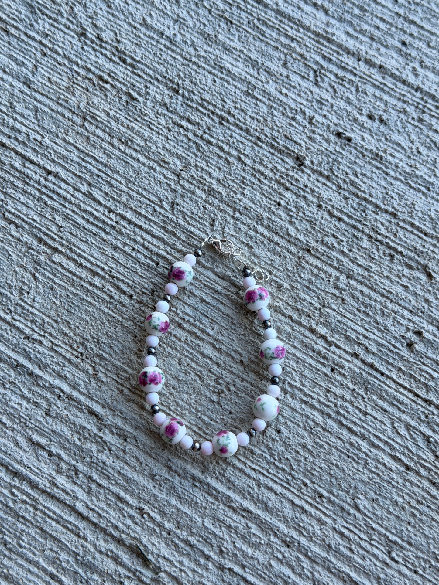 6.5-7.5” Pink Conch & Floral