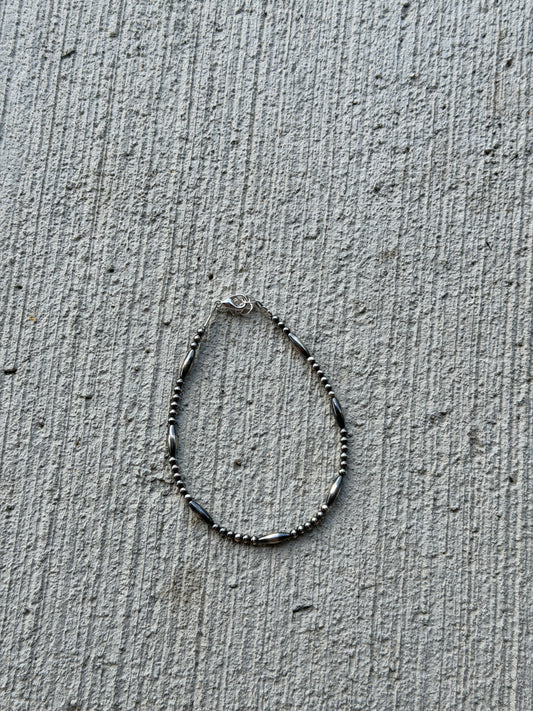7-7.5" 2.5mm Pearl & Torpedo