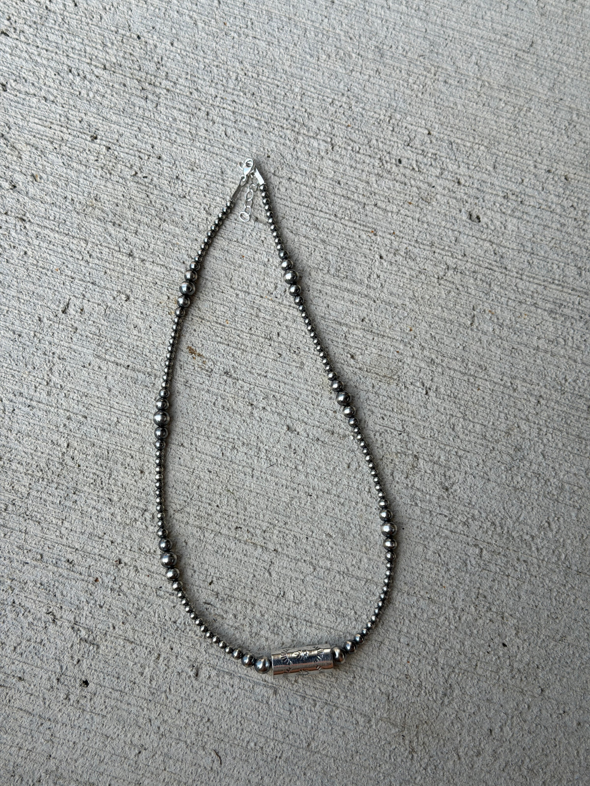 17-18.5" Pearl & Stamped Barrel Bead