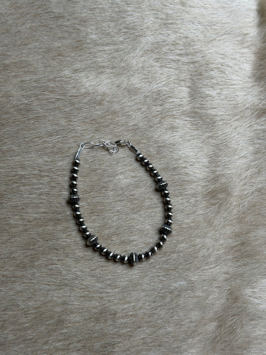 6-6.5" 4mm Pearl & Cor. Saucer