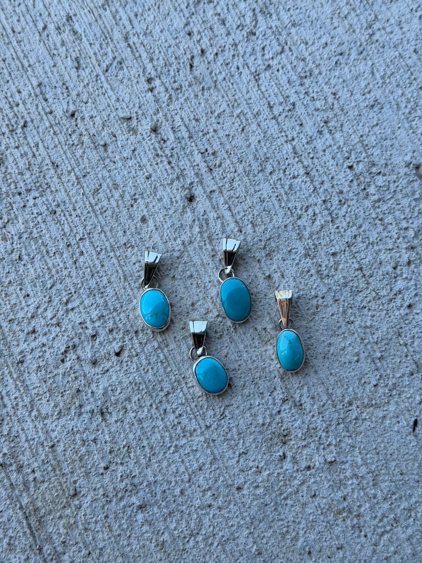 Kingman Turquoise Pendants